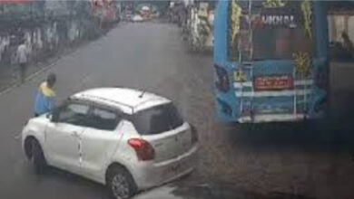 Police drives staff on bonnet