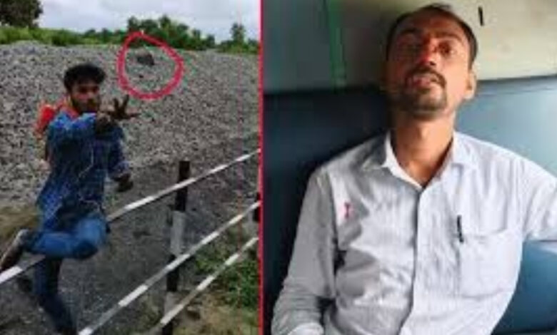 man throughs stones on train passengers