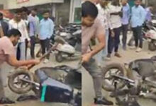 man smashed ola e scooter