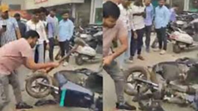 man smashed ola e scooter